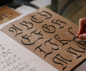 Initiation à la calligraphie - Journée des Sires de Beaujeu